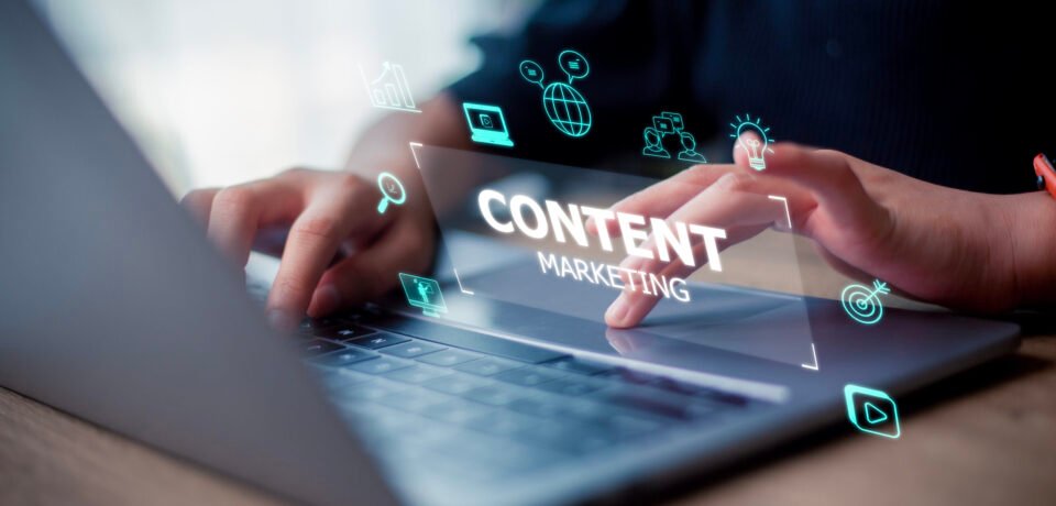Content marketing concept with a woman working on a laptop on a Content marketing concept with a woman working on a laptop on a futuristic virtual interface screen.